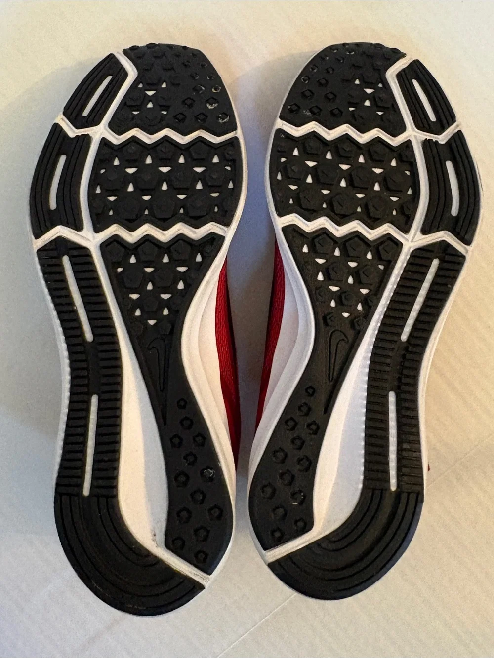 Nike Men’s Red Athletic Running Shoes with Black Swoosh